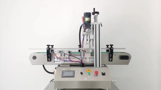 Machine de capsulage de type table Machine de conditionnement de bouteilles de pulvérisation en verre pour boissons à eau semi-automatique Machine de capsulage